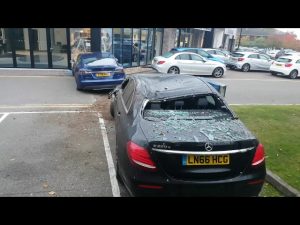 Tesla S FLIES over MERCEDES and then crashes into dealership in BIZARRE CRASH