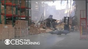 Fighter jet crashes into California warehouse