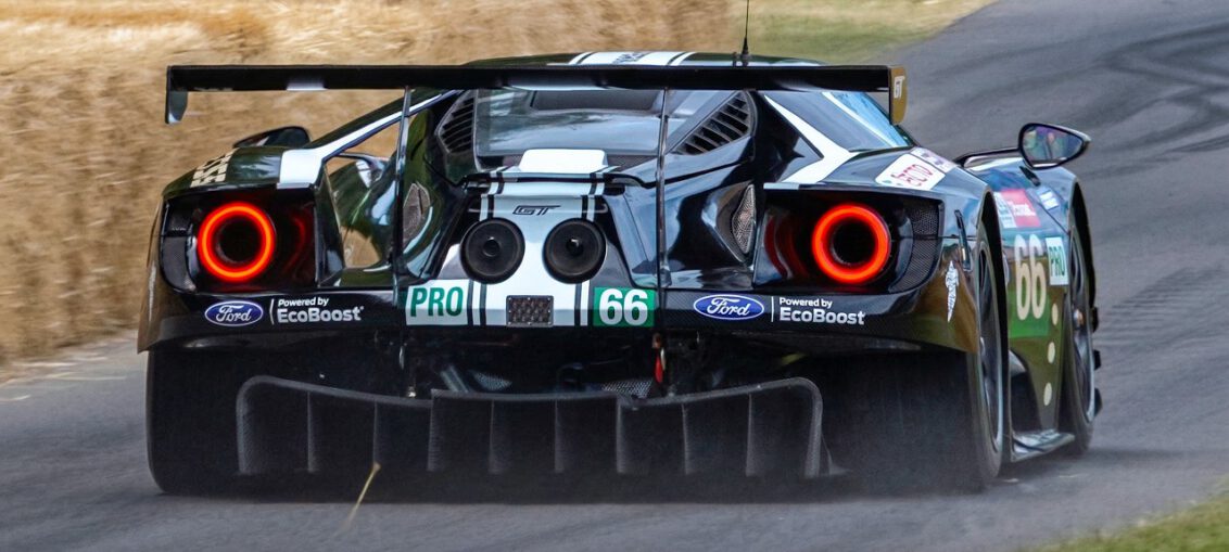Ford GT LM GTE racecar accelerating on track during endurance racing event
