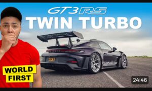 Twin turbo Porsche 992 GT3 RS accelerating on runway during performance test