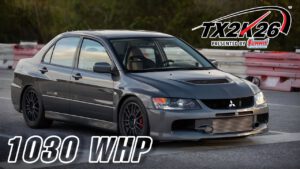 1030WHP Mitsubishi Evo IX MR performing high-speed roll racing pull at TX2K26 event