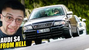 Audi S4 B5 drifting aggressively through a corner at the Nürburgring Nordschleife