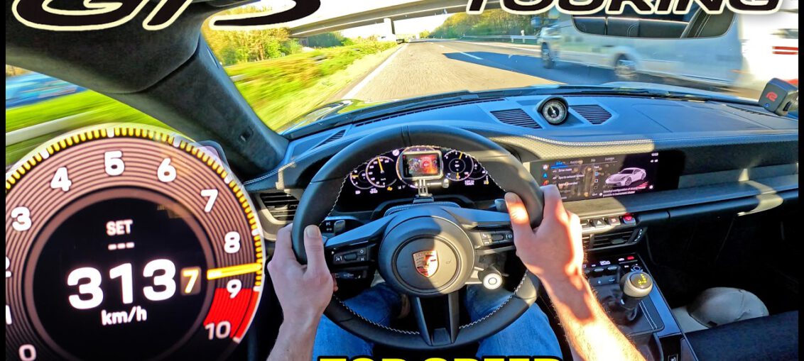 2026 Porsche 911 GT3 Touring 992.2 performing high-speed top speed run on the German Autobahn.