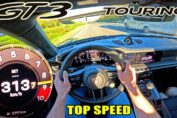 2026 Porsche 911 GT3 Touring 992.2 performing high-speed top speed run on the German Autobahn.