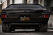 Black 1970 Chevrolet Chevelle Restomod powered by a supercharged LSX V8 engine, featuring custom wheels, modern suspension, and nearly 900 horsepower.
