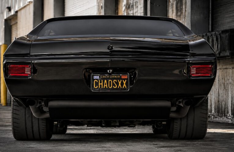 Black 1970 Chevrolet Chevelle Restomod powered by a supercharged LSX V8 engine, featuring custom wheels, modern suspension, and nearly 900 horsepower.