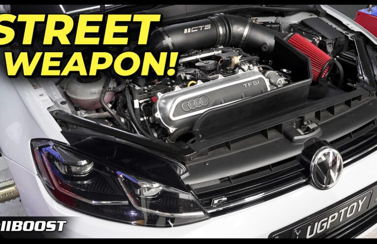 White Volkswagen Golf R with a Daza Audi RS3 5-cylinder engine swap and large turbocharger producing over 1000 horsepower.