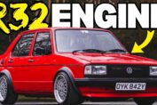 Classic Volkswagen Mk1 Jetta fitted with a 3.2-liter R32 VR6 engine swap driving on a country road.