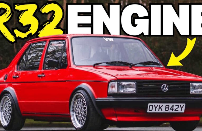 Classic Volkswagen Mk1 Jetta fitted with a 3.2-liter R32 VR6 engine swap driving on a country road.