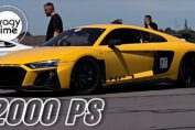 A 2000HP Twin Turbo Audi R8 V10 accelerating at full speed during a high-performance run, reaching 373 km/h (231 mph).