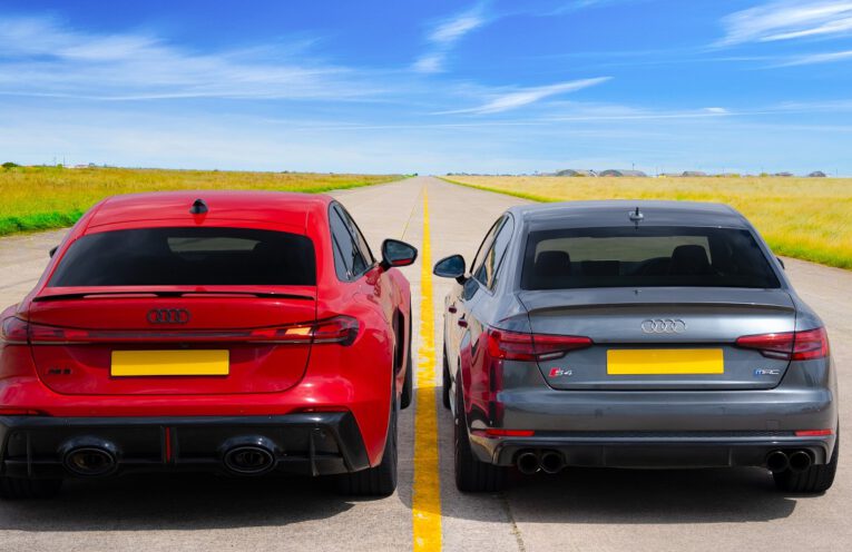 New Audi RS5 racing a tuned Audi S4 in a drag race