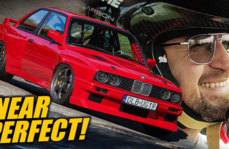 BMW E30 M3 restomod with M54 engine driving at the Nürburgring